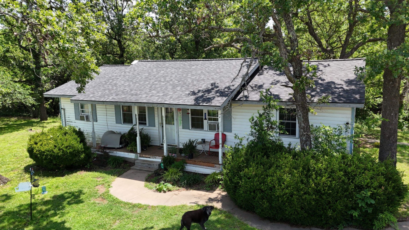 Oklahoma home before roof and siding renovation by Top Priority